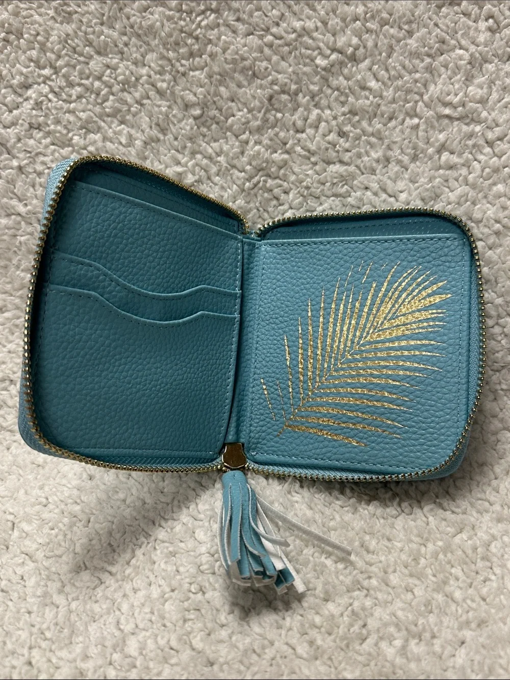 cleobella super cut turquoise  zip wallet, gold trim, tassel,cutouts design NWOT